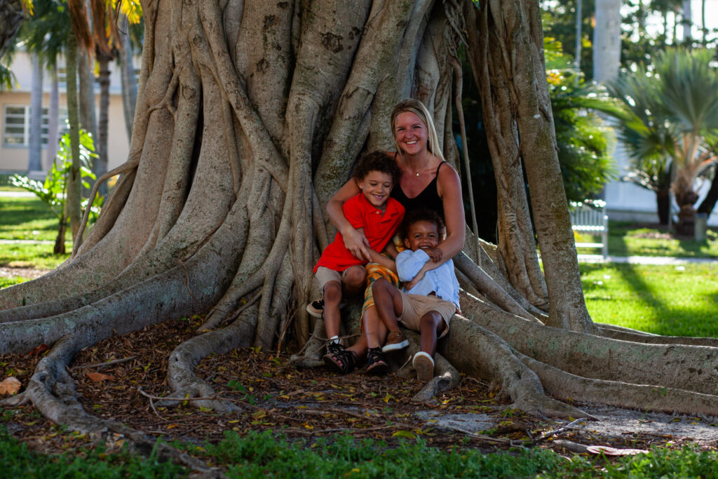 Mom hugs two sons