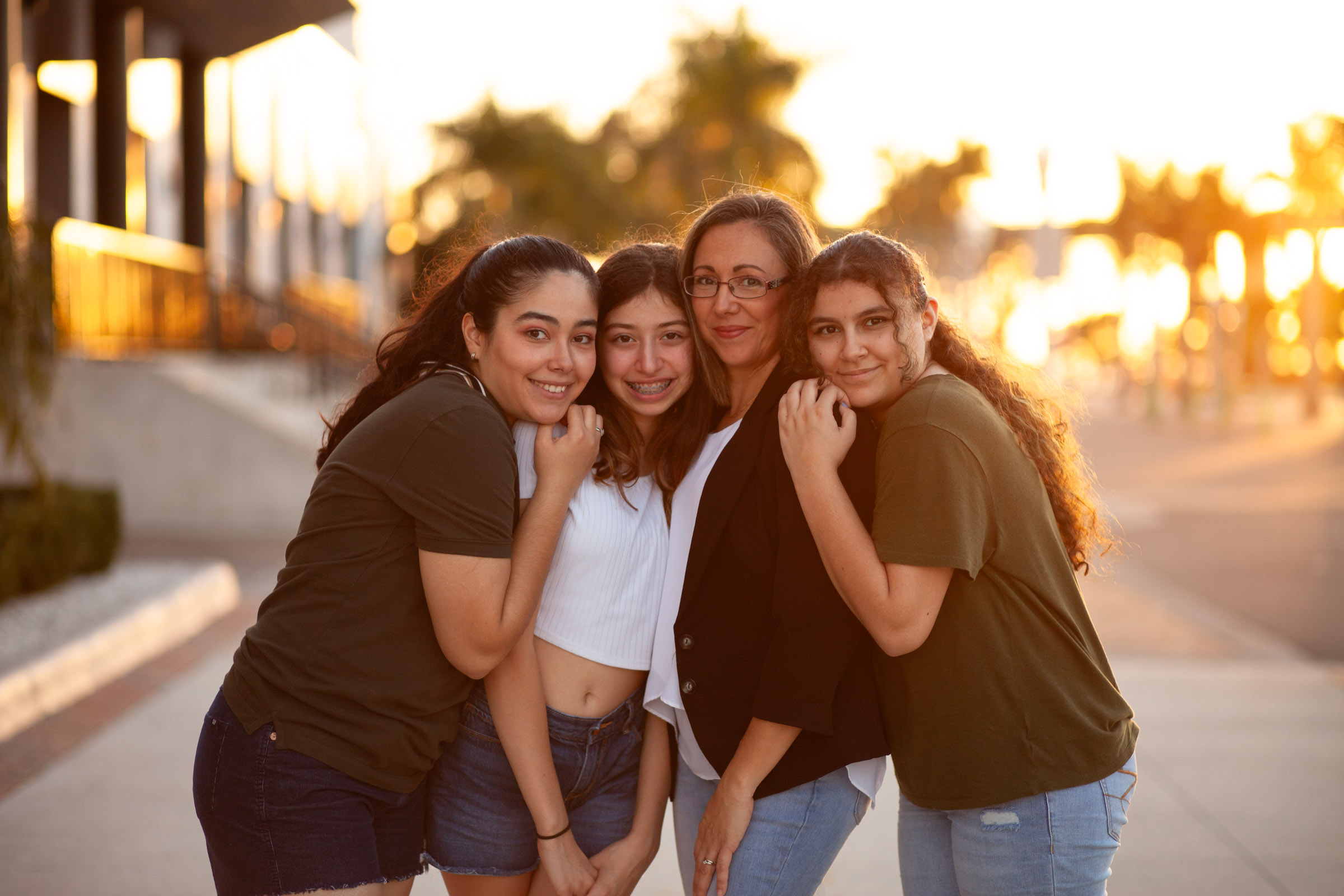 Golden hour photo of mom and daughters