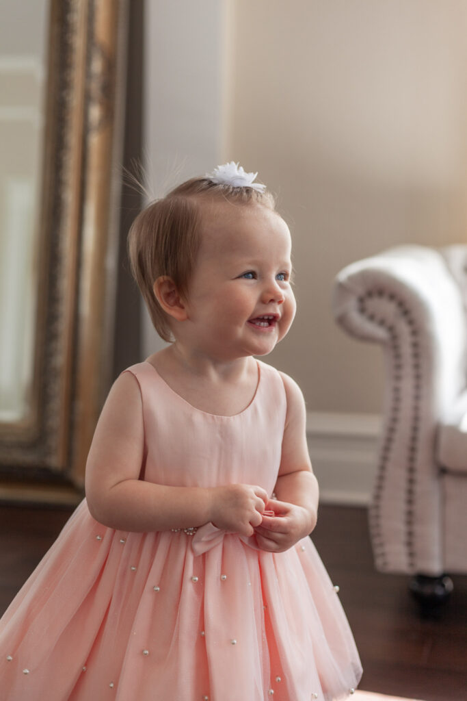 smiling one year old girl