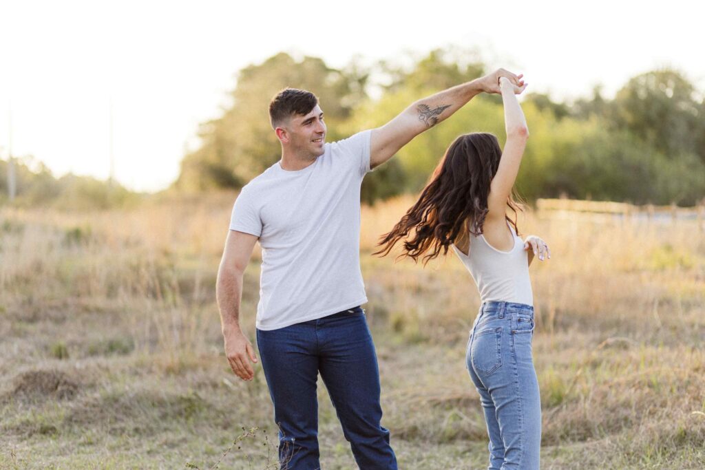 Couple dancing in the field at Caloosahatchee Creeks Preserve