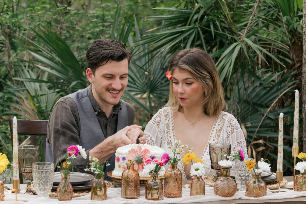Couple cuts their elopement cake