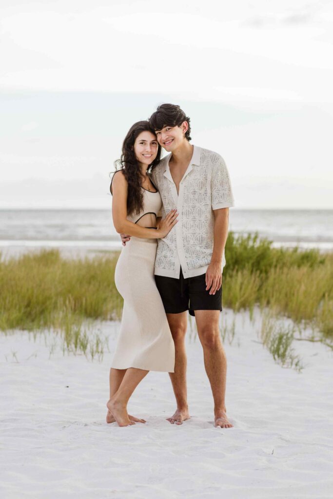Couple pose on the beach