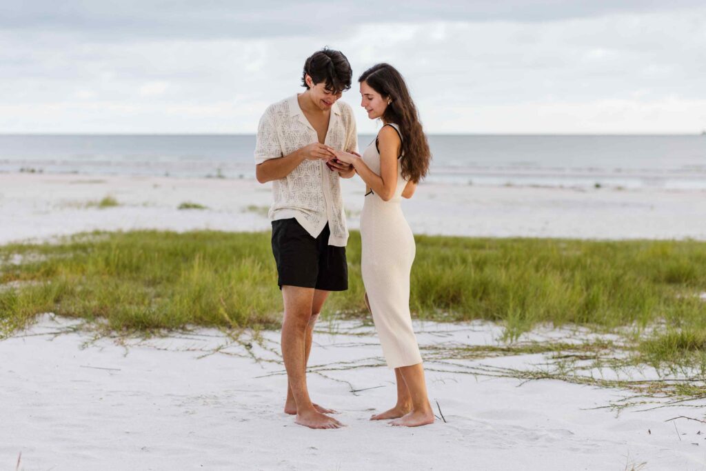 Man places ring on fiance's finger at Fort Myers Beach