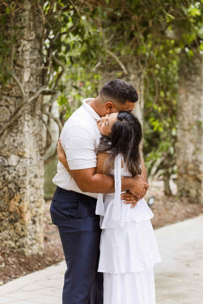 Couple hugs after their proposal
