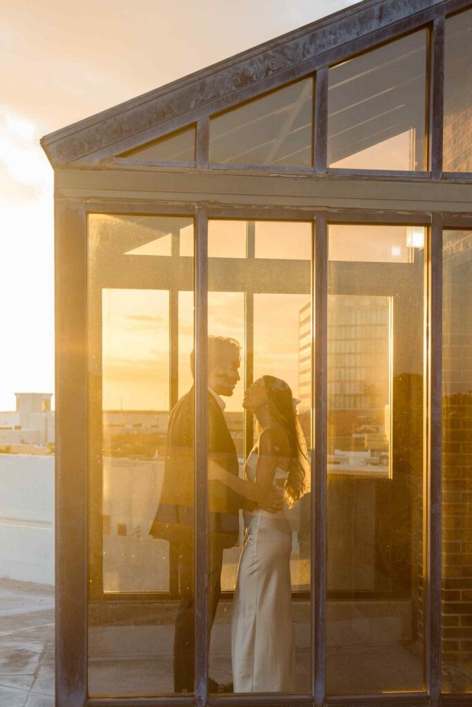 Bride and groom having a first dance on top of a parking garage in Downtown Fort Myers