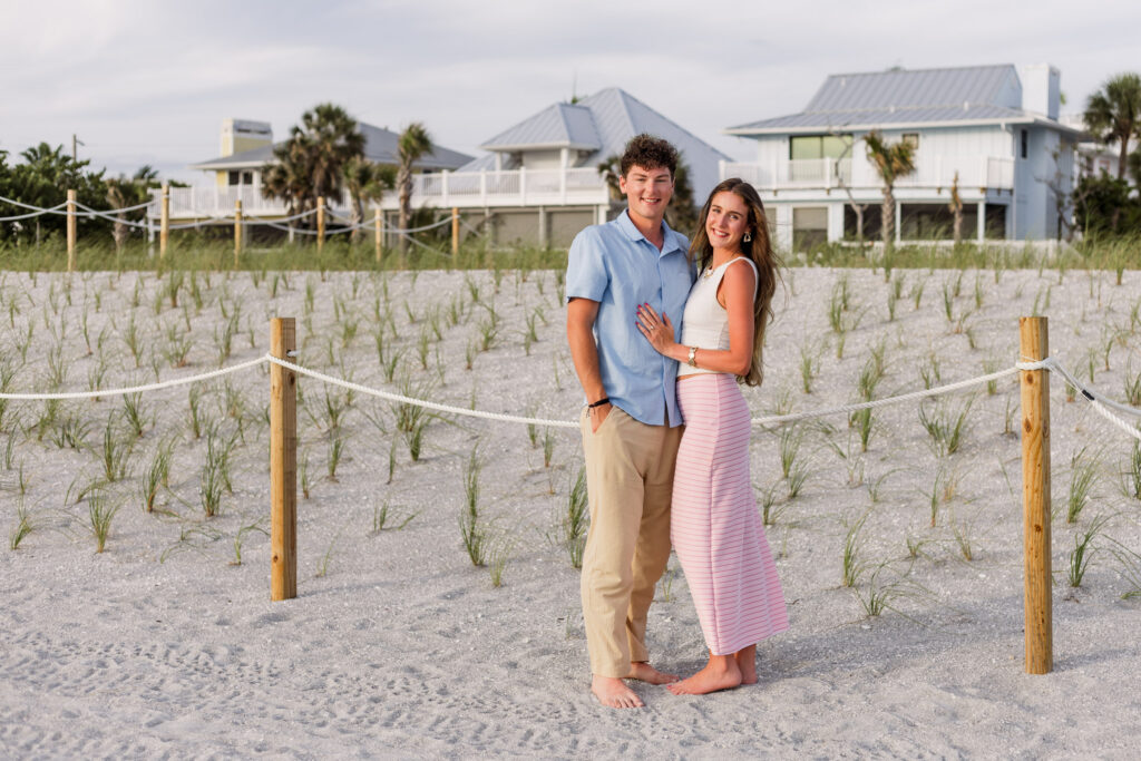 Newly engaged couple poses for a photo on Captiva Island