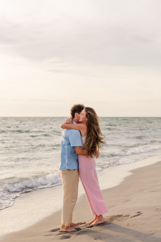 Couple hugs on Captiva beach