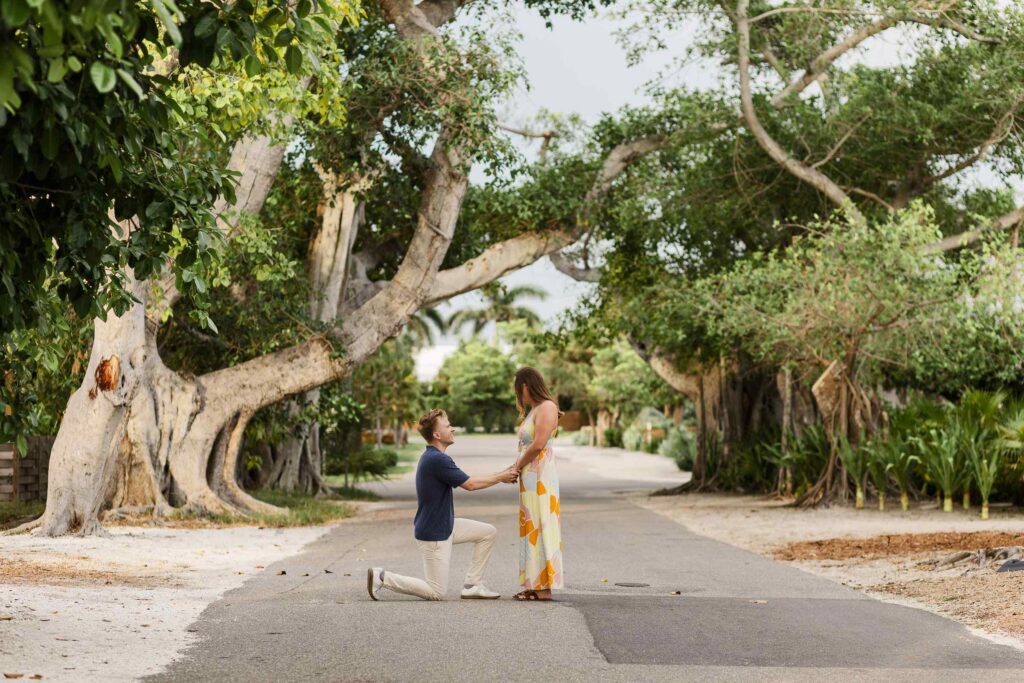 Man proposing to his girlfriend on Banyan Street in Boca Grande