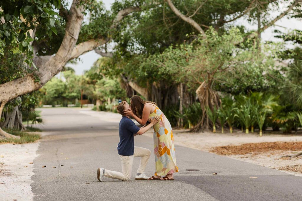 Man proposing to his girlfriend on Banyan Street in Boca Grande