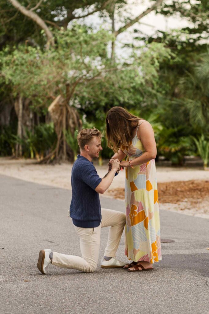 Man proposing to his girlfriend on Banyan Street in Boca Grande